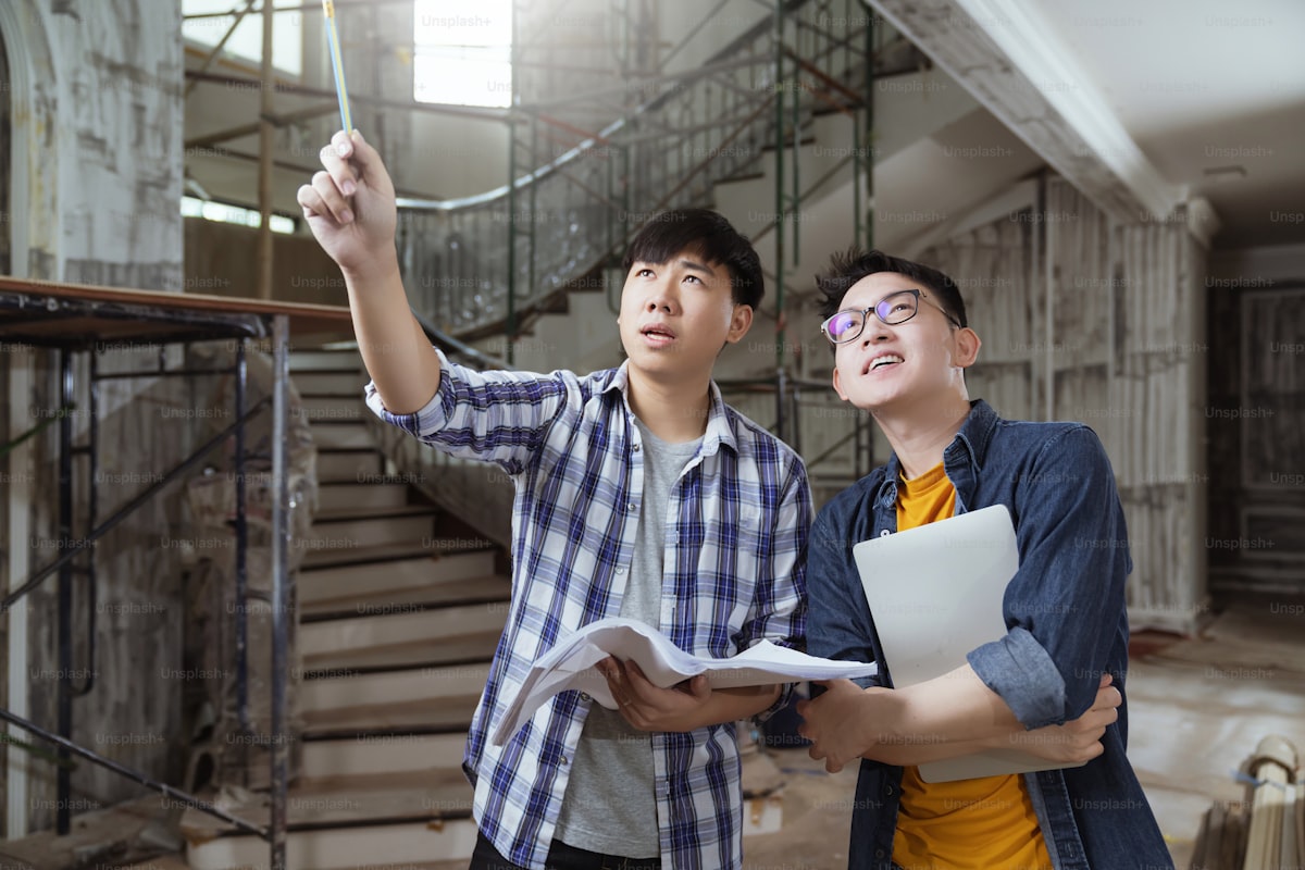 How to offer customer financing as a contractor — contractor reviewing monthly payment options with a homeowner