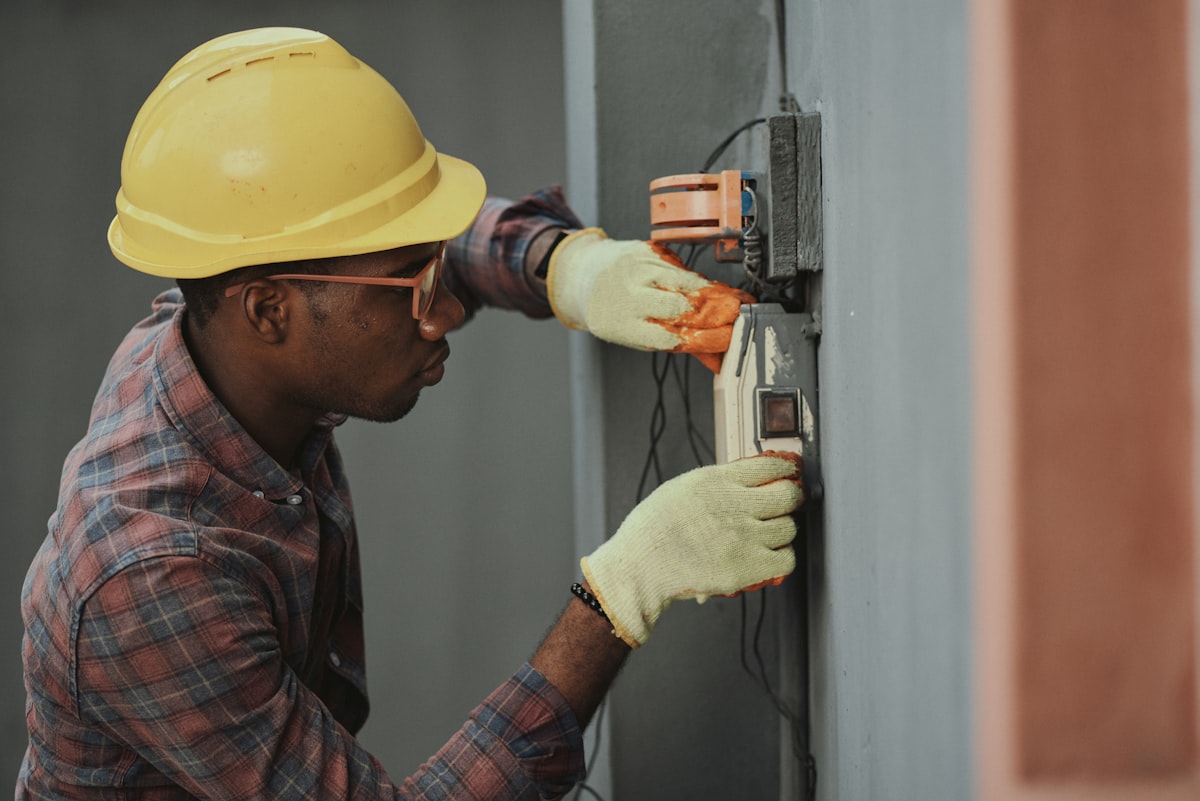 HVAC technician installing a system after a proposal was accepted using the best hvac proposal software
