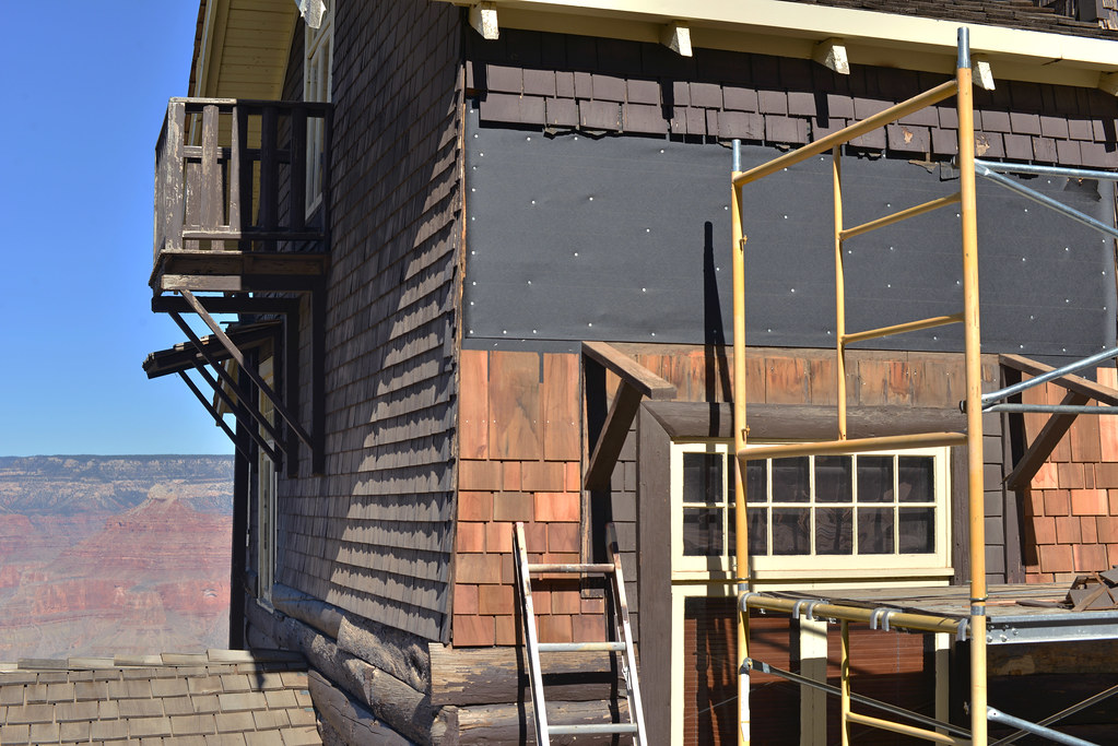 How much does it cost to replace a roof — residential roofing renovation project in progress